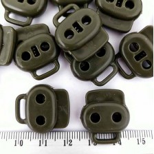 стопор плоский овальный D15мм - хаки (1000 шт) ПРИШИВНОЙ